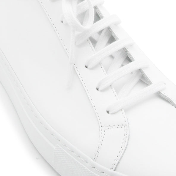 Minimalist White Leather Sneakers With Refined Gold Detail