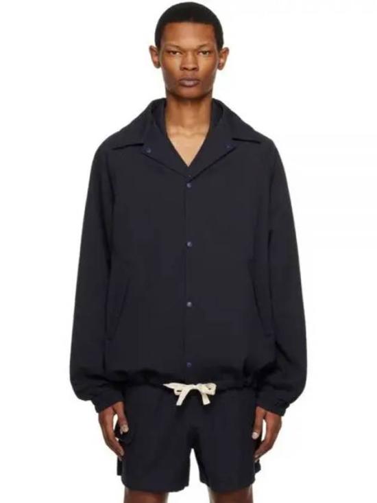 Minimalist Black Jacket with Button-Up Front