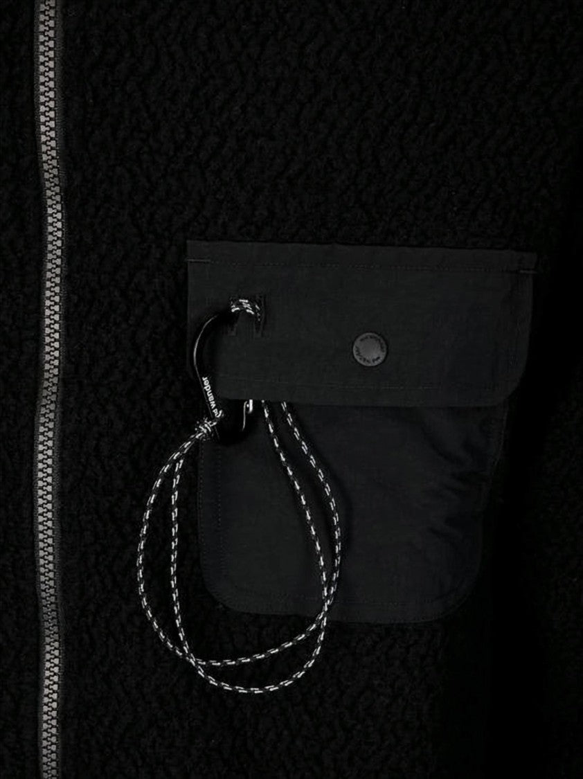 Textured Black Jacket With High Collar And Unique Pocket Design