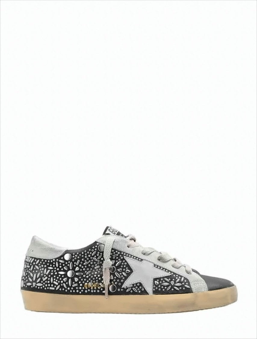 Black Leather Low-Top Sneakers with Floral Cut-Out Design
