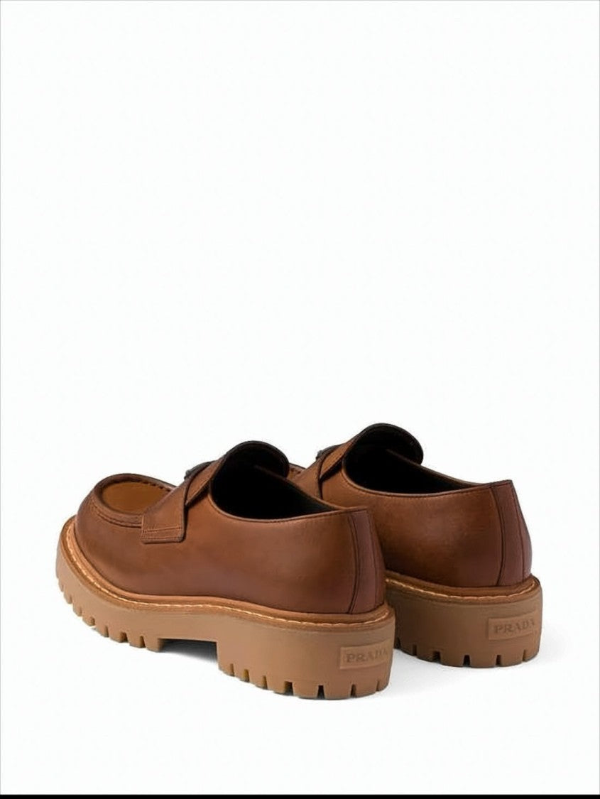 Polished Calf Leather Loafers with Triangular Logo Plaque