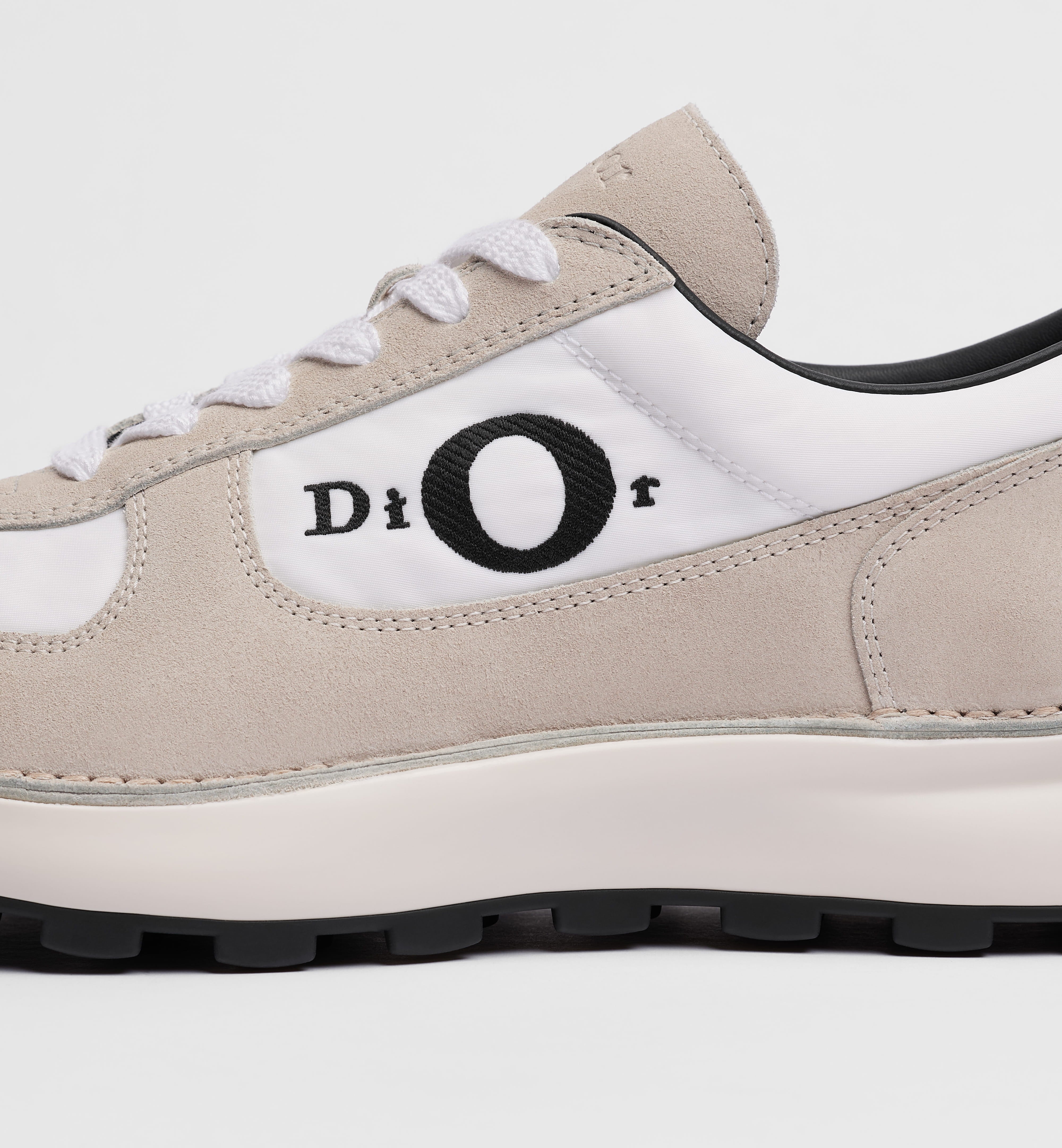 Low-Profile Sneaker With Textured Design And Bold Logo