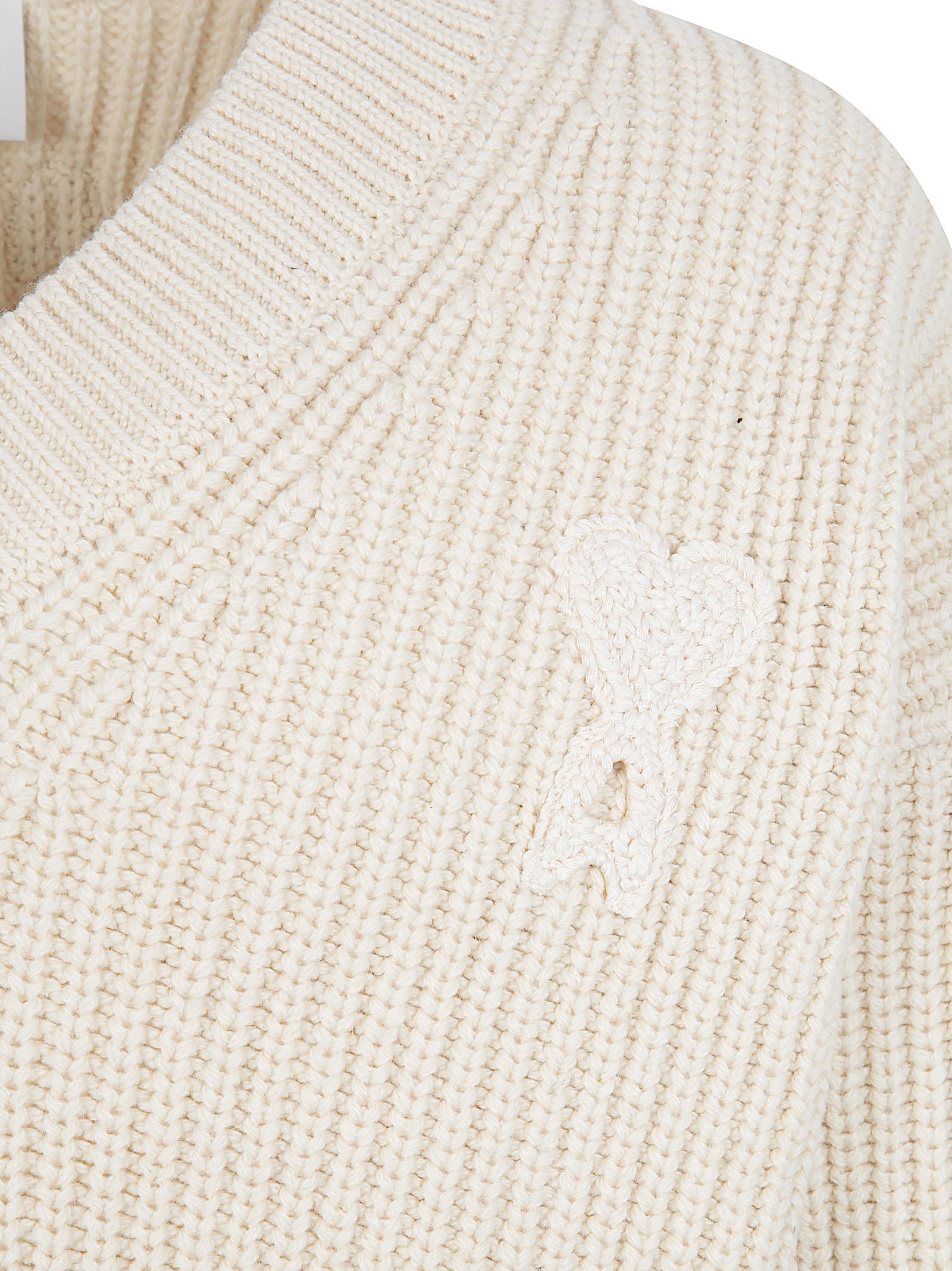 Ribbed Knitted Sweater with V-Neckline and Crochet Accents