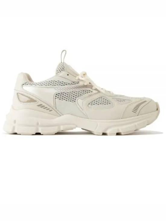 Layered White Sneaker with Chunky Sole and Textured Detailing