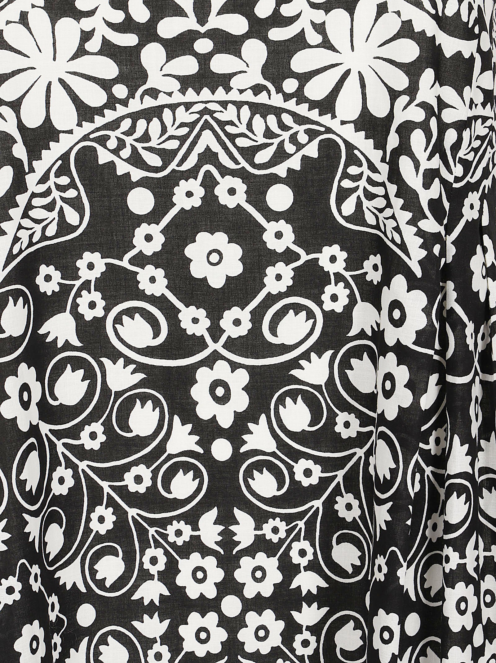 Sleeveless Floral Print Dress with Wide Straps and Flowing Silhouette