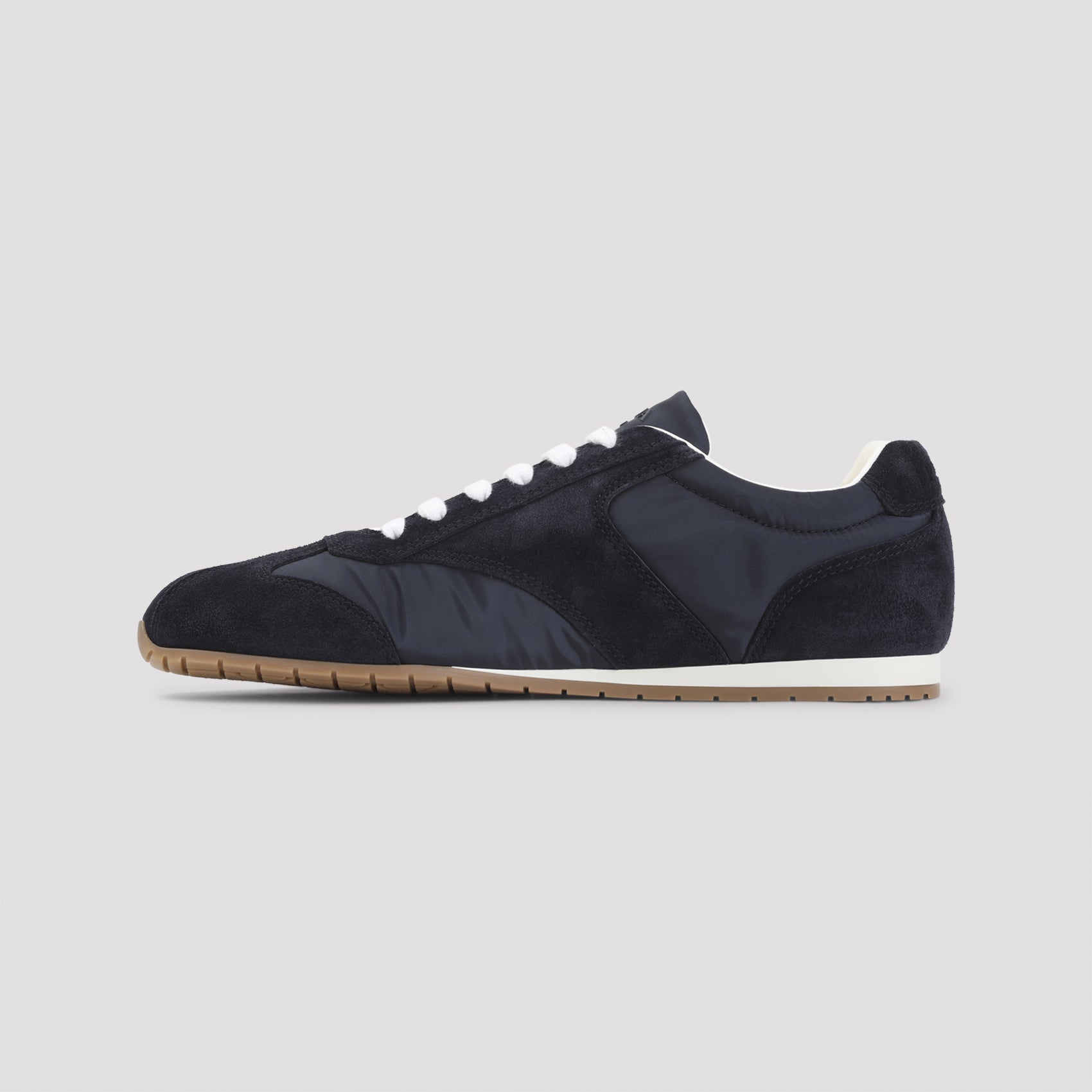 Low-Profile Black Sneakers with Textured Panels