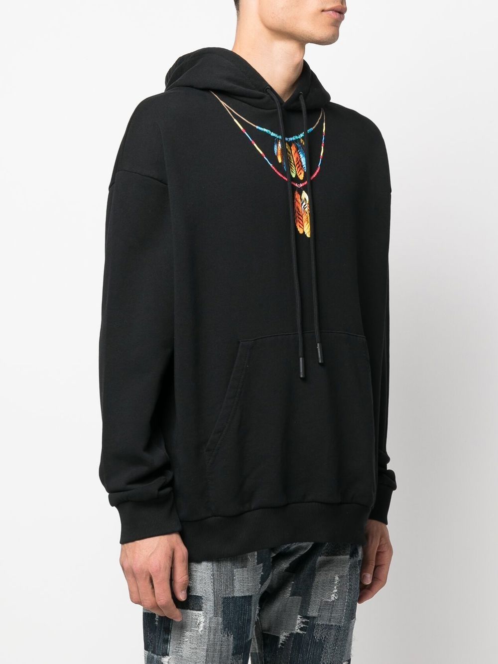 Black Feathers Necklace Over Cotton Hoodie