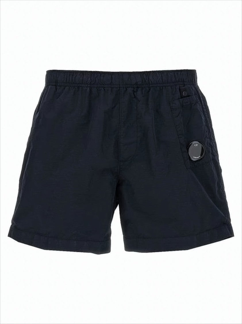 Minimalist Blue Swim Shorts with Distinctive Lens Detail