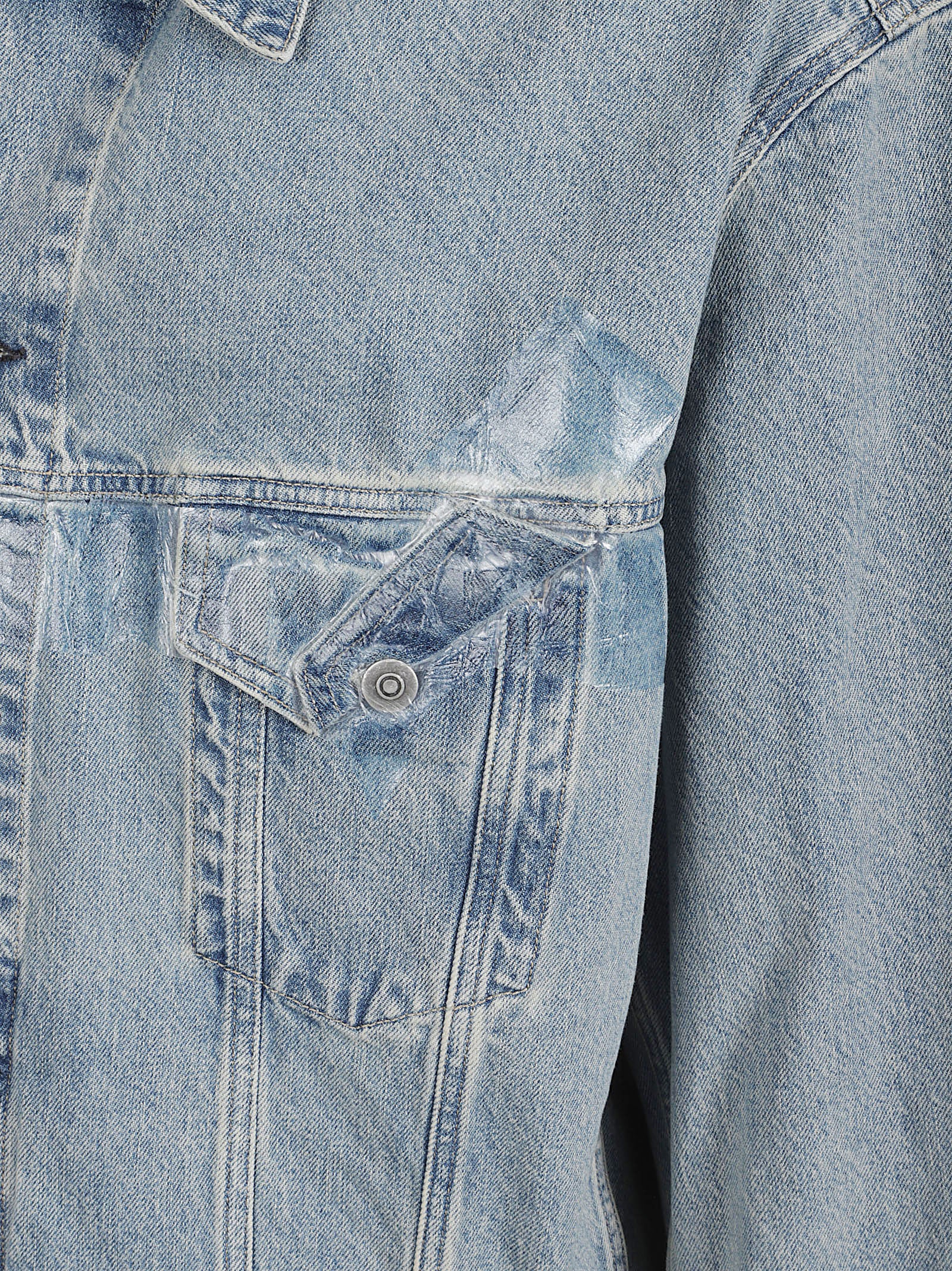 Light Wash Denim Jacket with Distressed Accents
