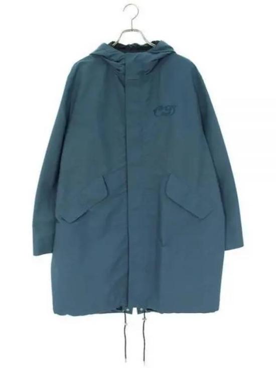 Hooded Blue Jacket with Adjustable Drawstrings and Flap Pockets