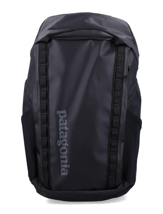 Structured Black Backpack With Webbing Loops And Padded Straps