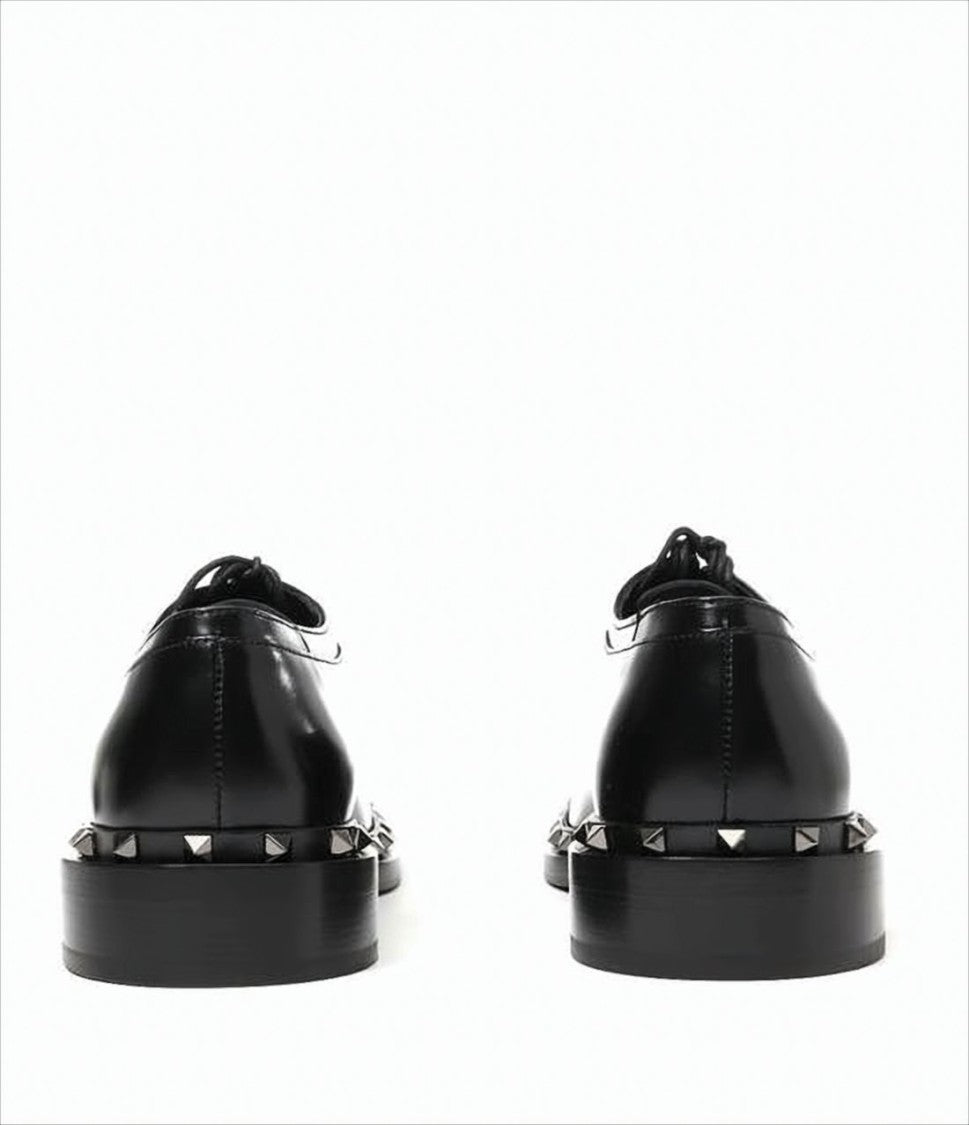 Classic Black Leather Loafers with Metallic Pyramid Studs