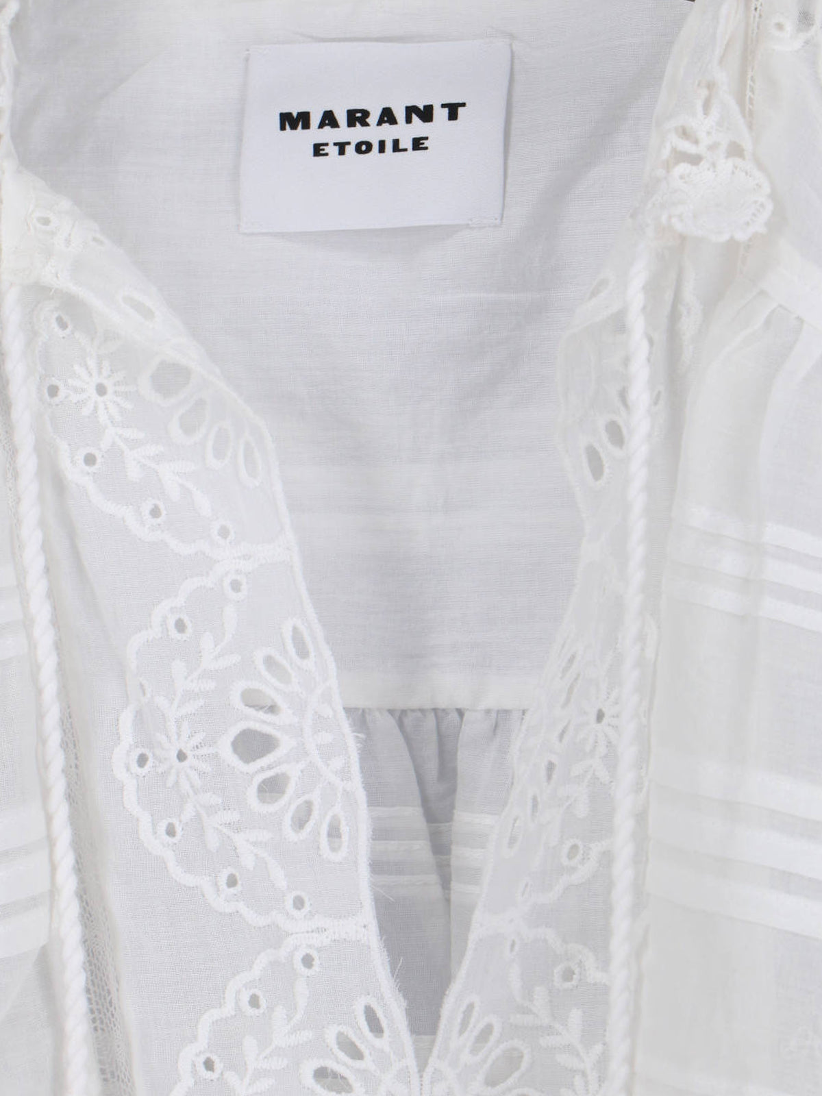 Flowing White Dress with Refined Silhouette