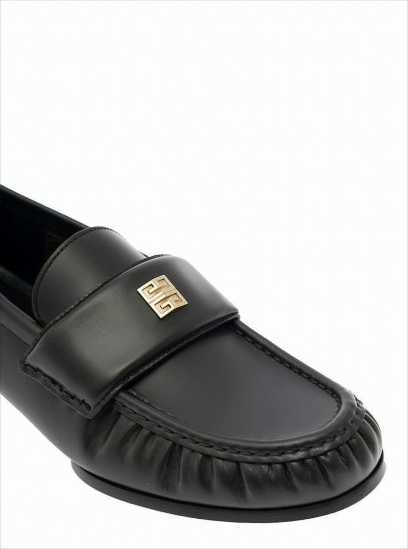 Black Lambskin Loafers with Moccasin Toe and Gold Emblem