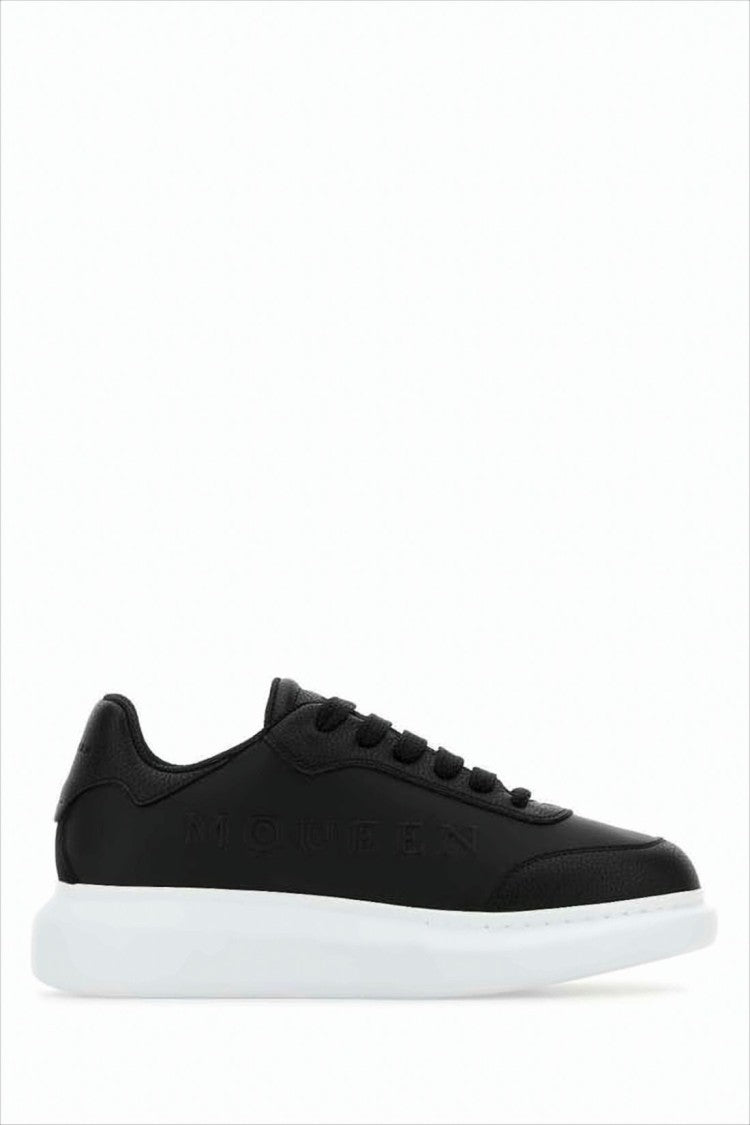 Low-Top Black Leather Sneakers with Contrasting White Sole