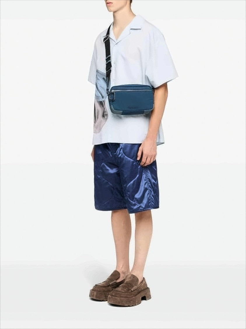Compact Rectangular Crossbody Bag with Distinctive Zipper Pull