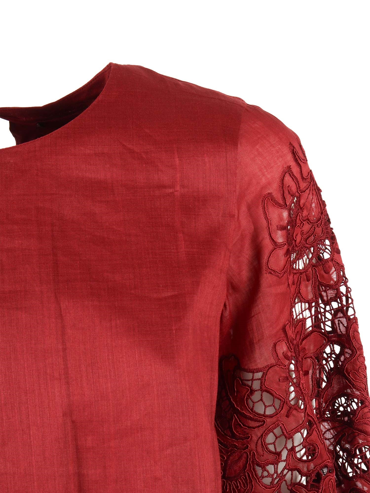 Voluminous Red Top with Floral Lace Cutouts