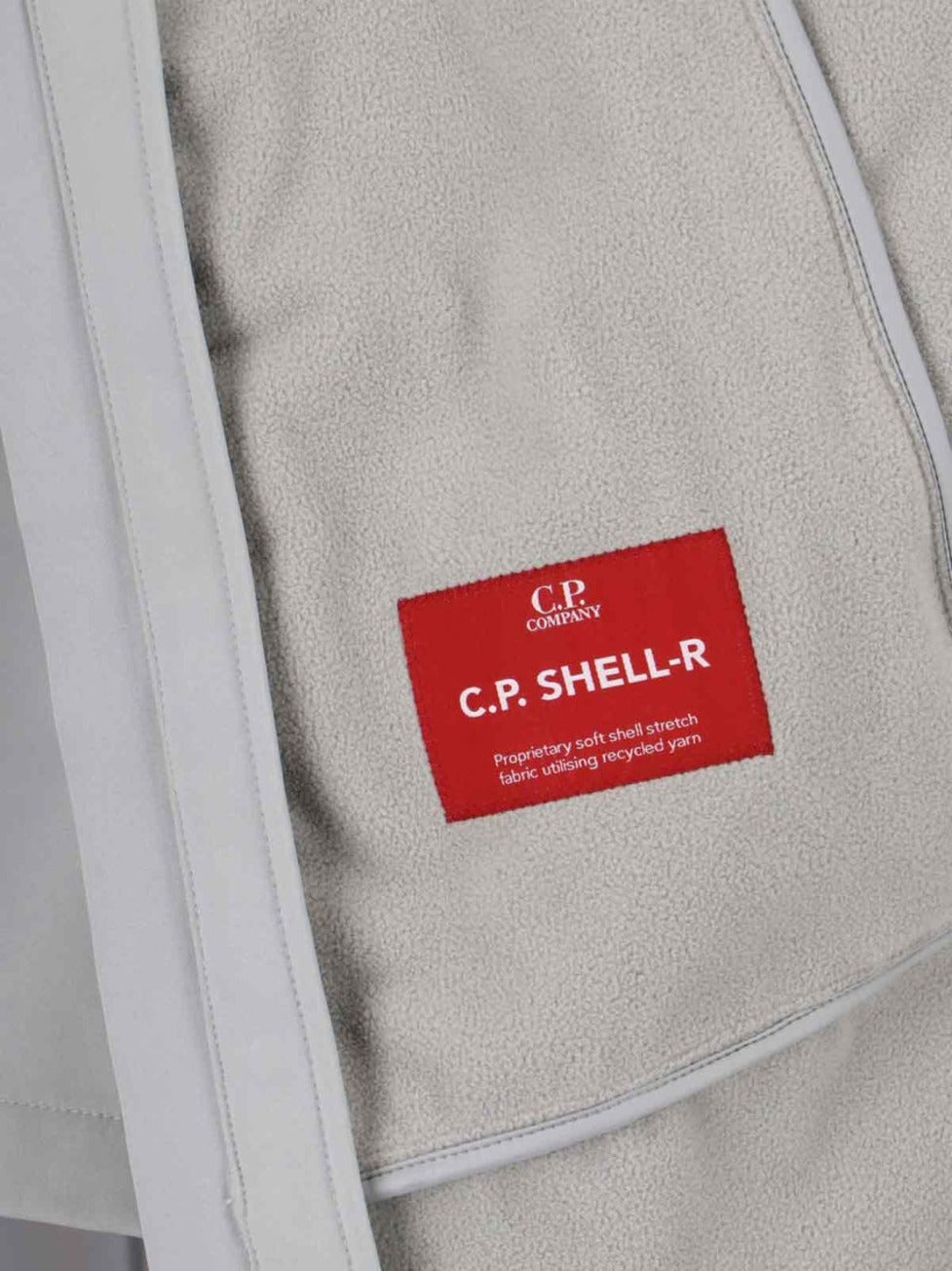 Sleeveless Light Grey Jacket With High Collar And Detachable Hood