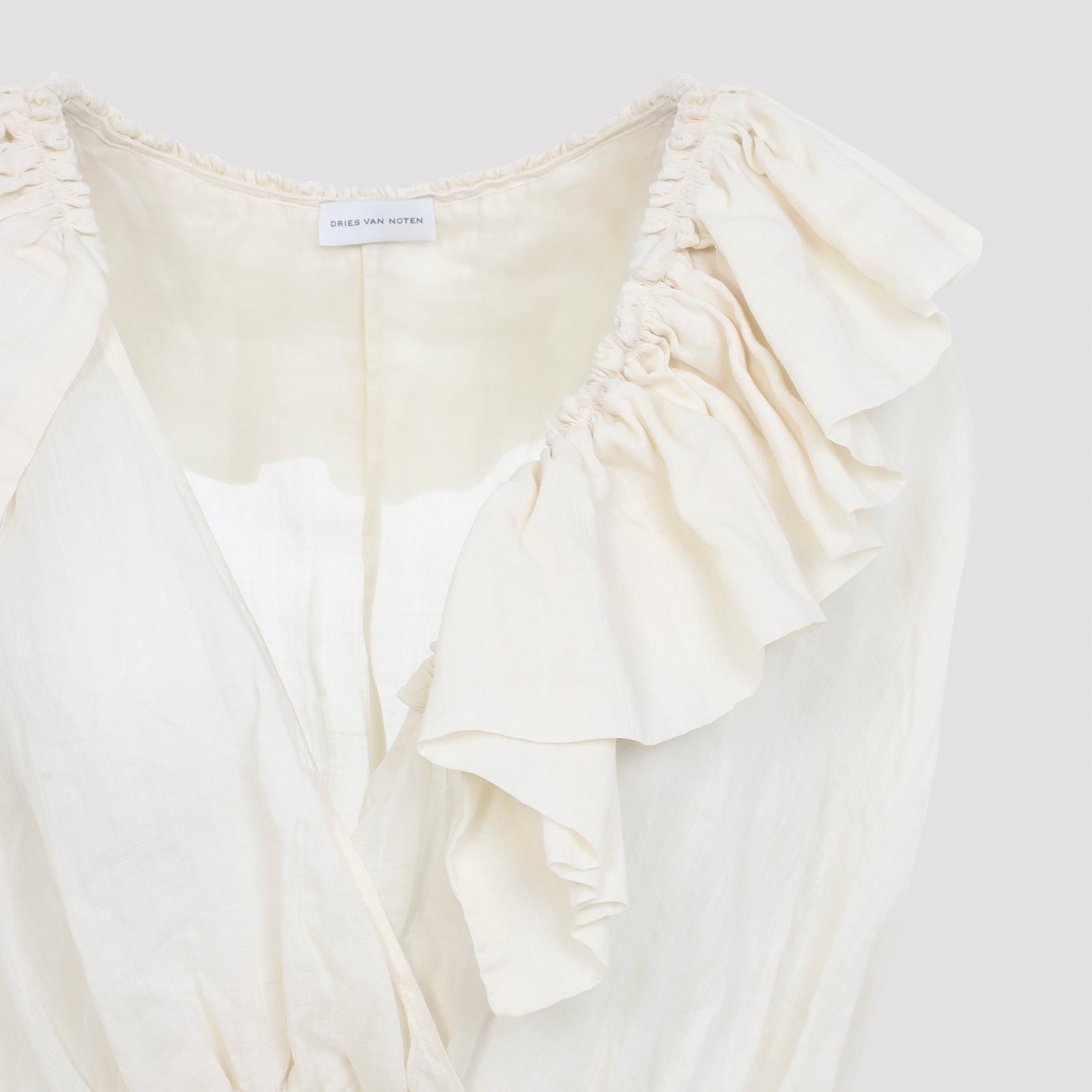 Sleeveless Ruffled Peplum Top