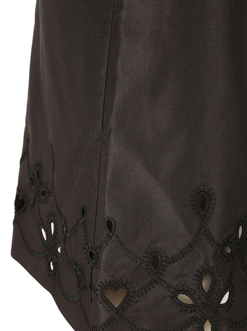 Black Skirt With Embroidered Hem And Cutouts