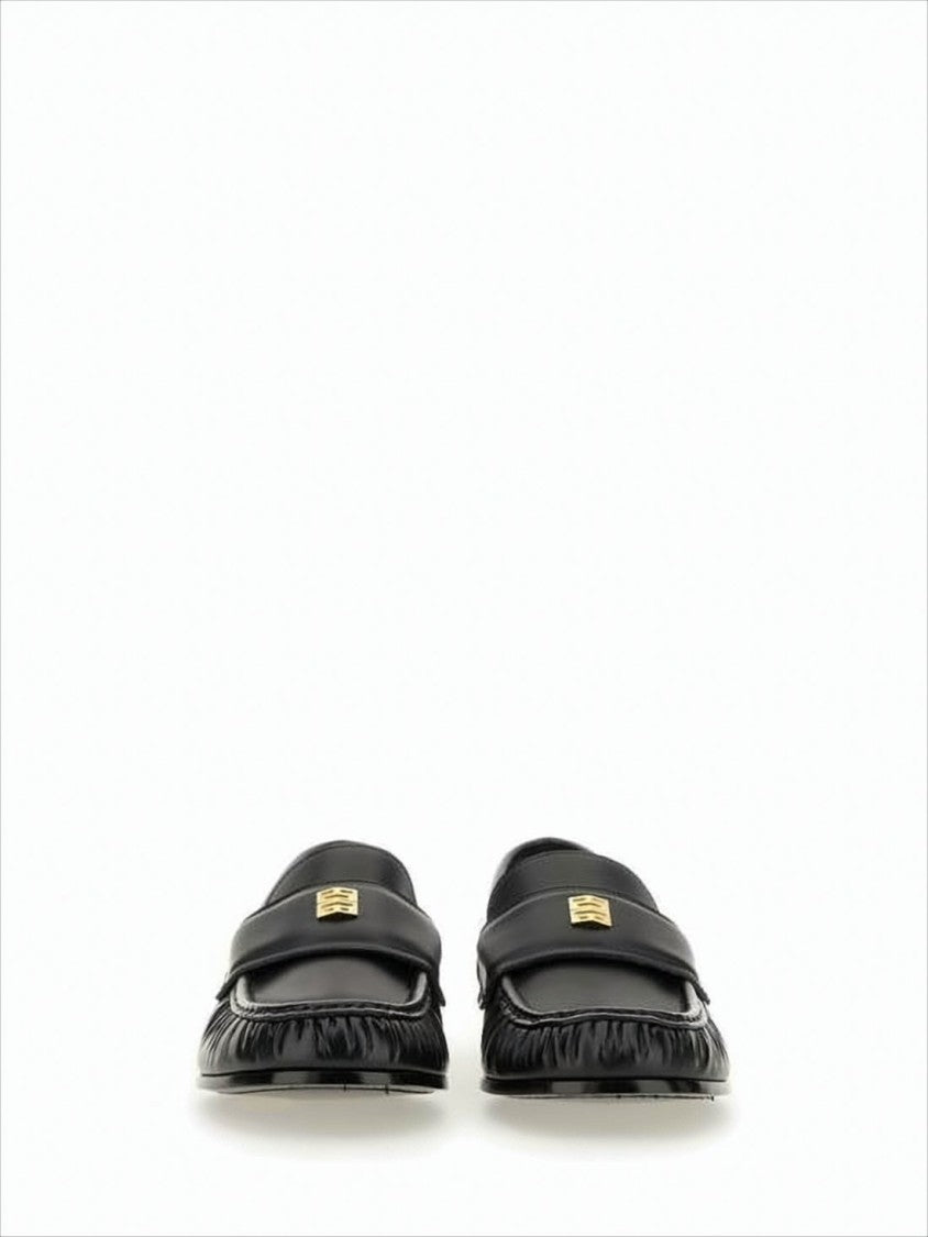 Black Lambskin Loafers with Moccasin Toe and Gold Emblem