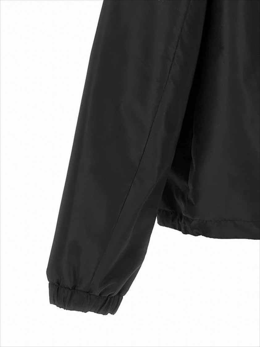 Black Hooded Jacket With Minimalist Design And Subtle Logo