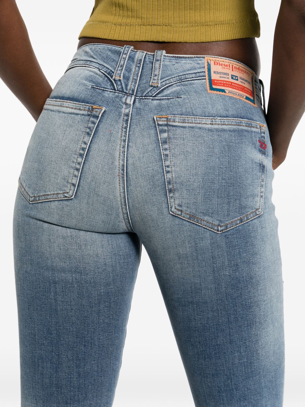 Faded Blue Denim Jeans with Flared Silhouette