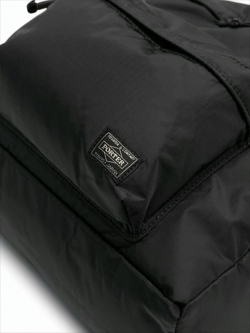 Black Nylon Backpack With Spacious Compartment And Versatile Carrying Options