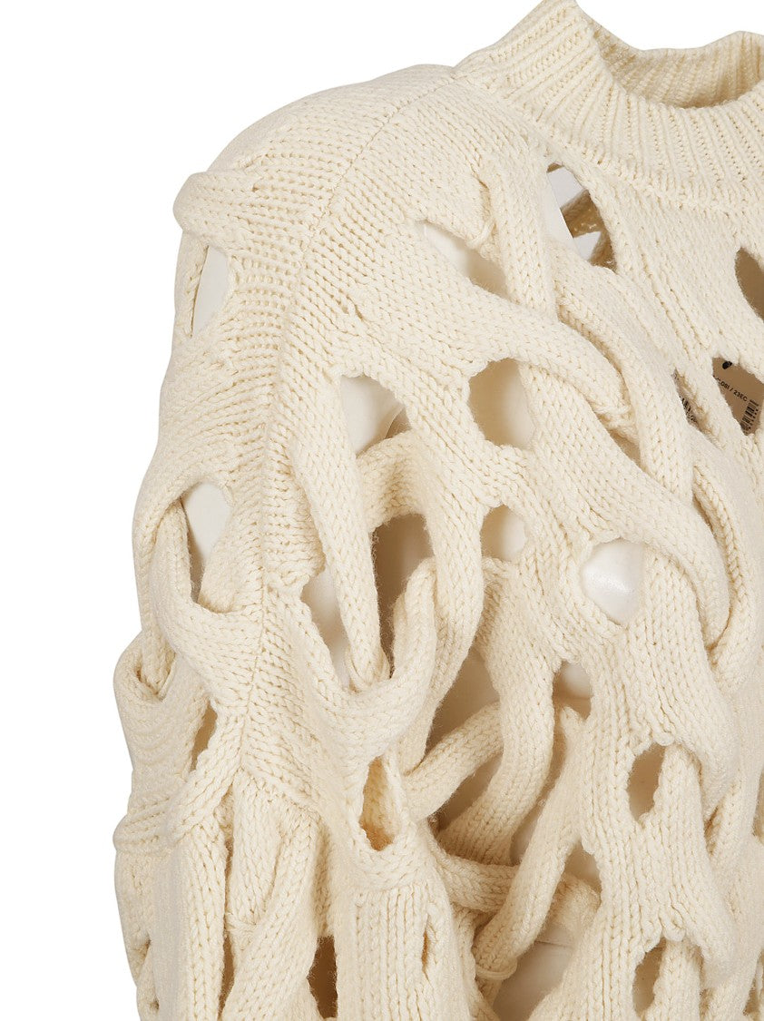 Open-Knit Sweater With Intricate Braiding And Voluminous Sleeves