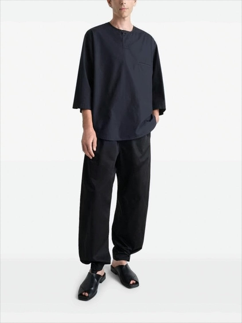 Boxy Black Blouse with Round Neckline