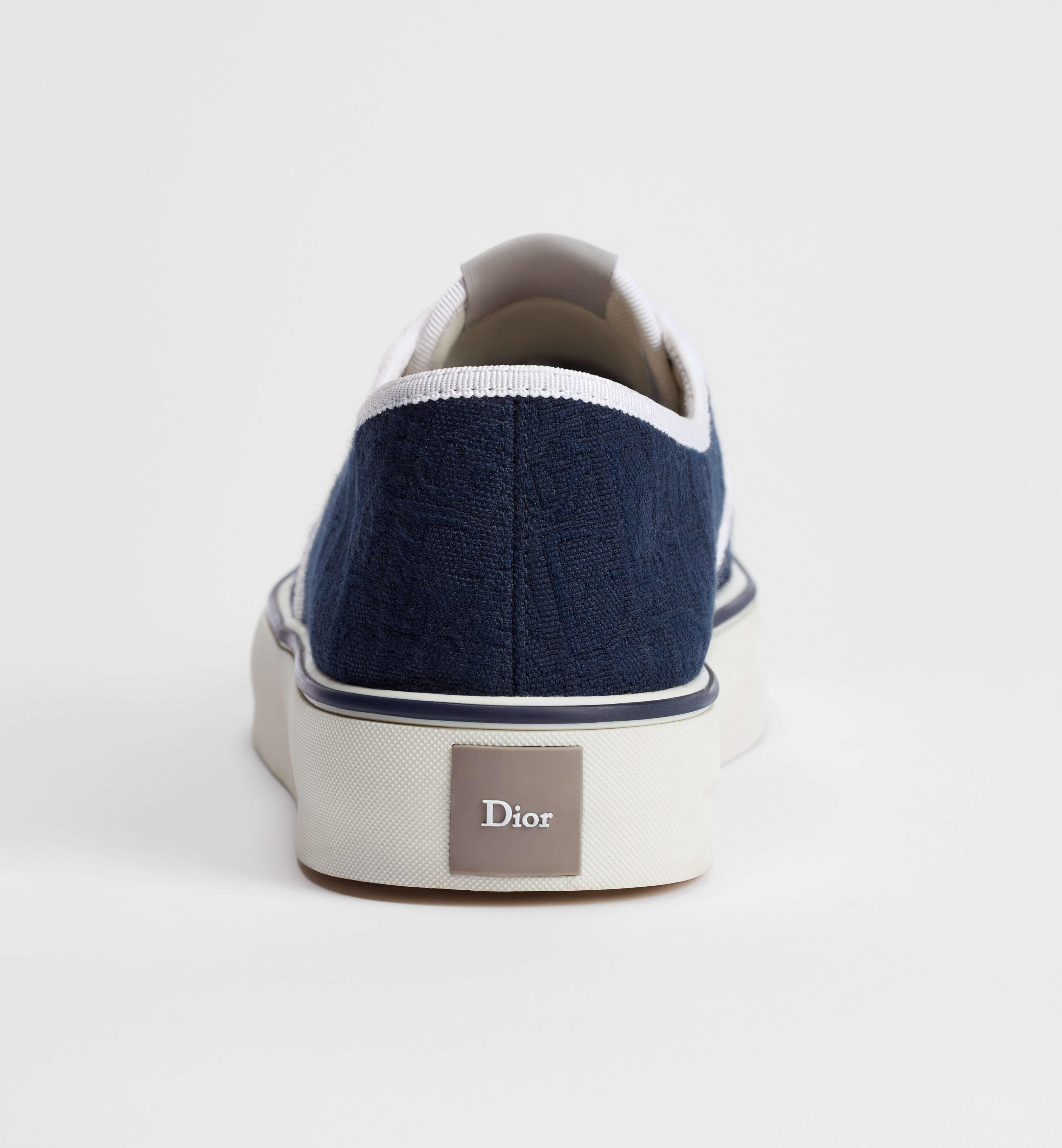 Low-Top Navy Sneaker With Textured Upper And White Accents