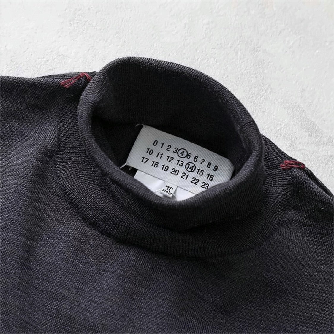 High-Neck Wool Knit Sweater With Four-Line Stitch Detail