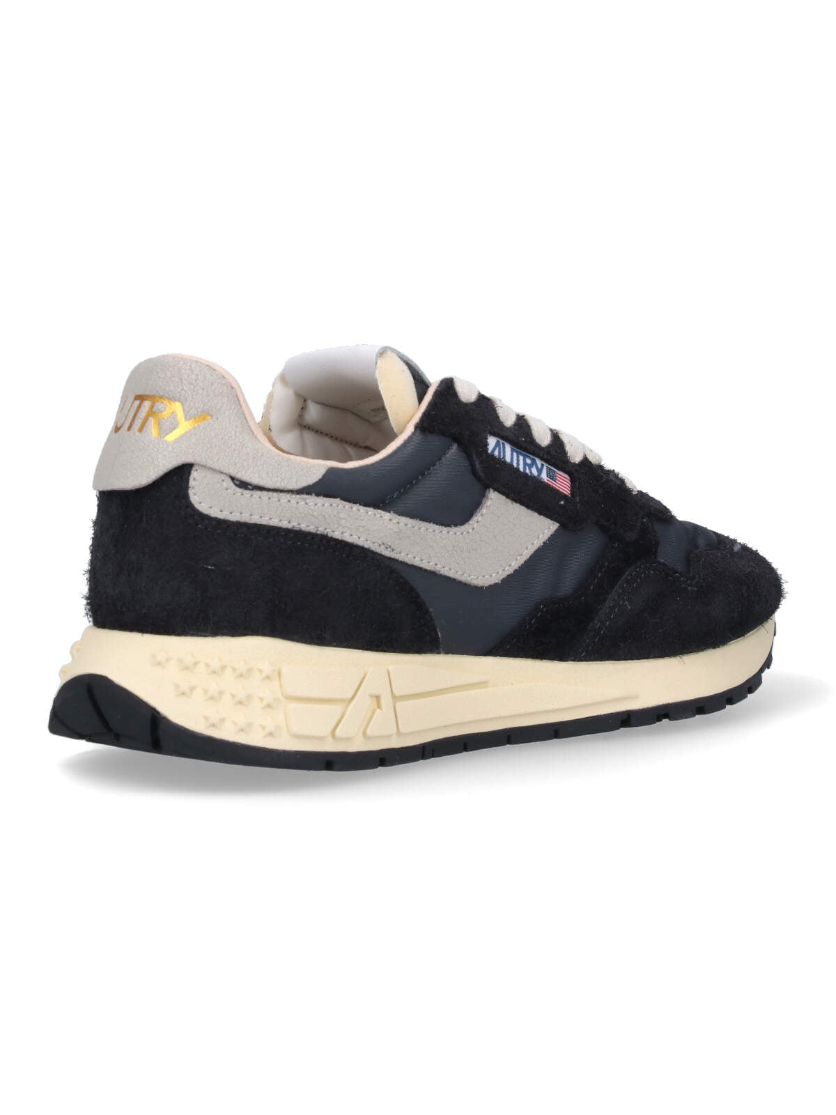 Streamlined Black Sneakers With Minimalist Design