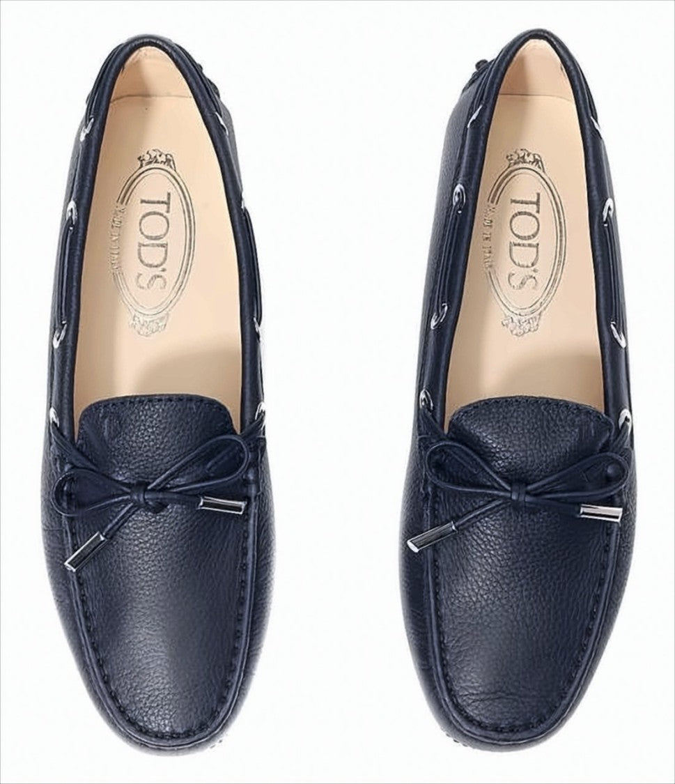 Pebbled Leather Loafers with Decorative Bow and Studded Sole