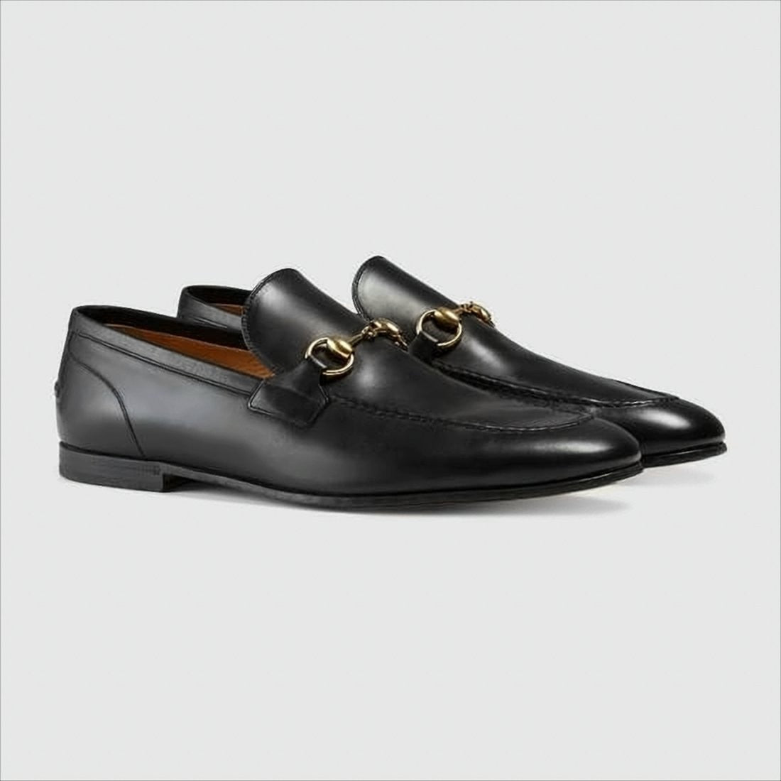 Black Leather Loafers with Gold Horsebit Detail