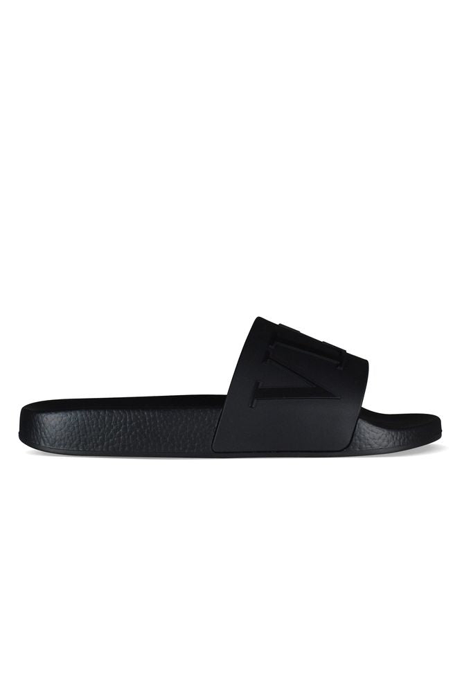 Black Rubber Flip-Flops With Raised Logo Detail
