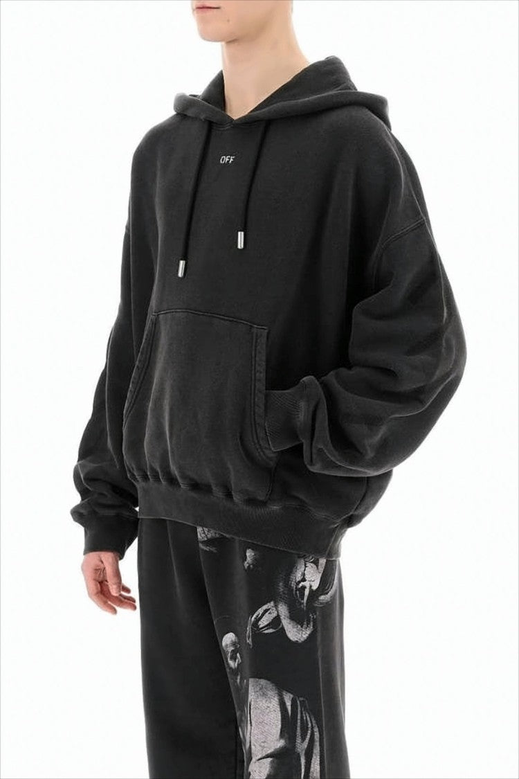Cropped Black Hoodie with Embossed Detailing and Graphic Print