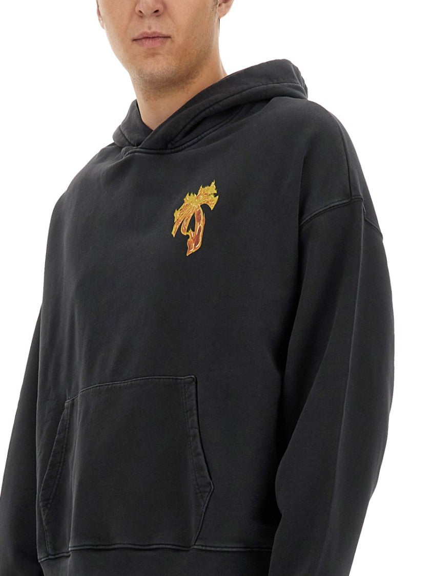 Relaxed Fit Black Hoodie With Vibrant Graphic Design