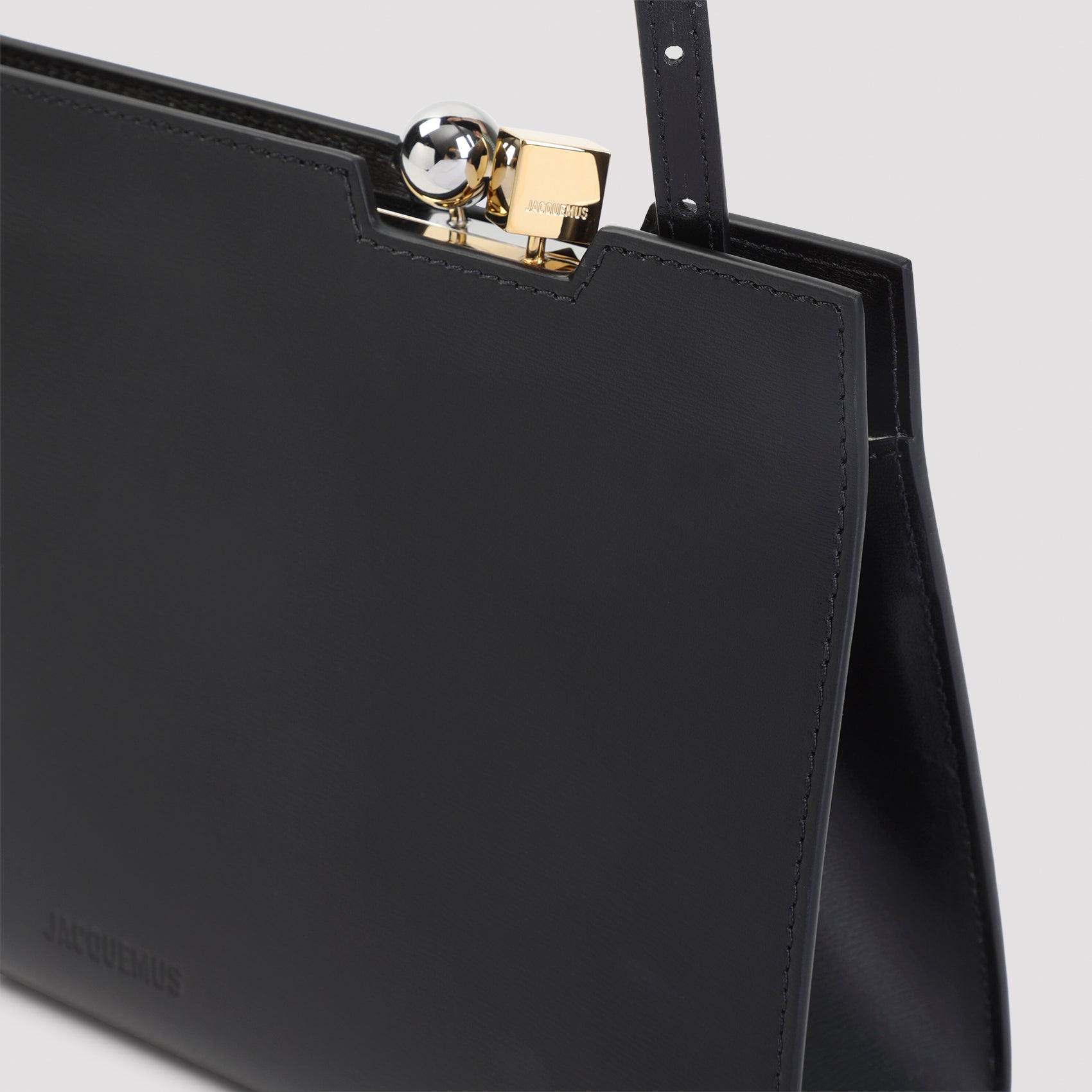 Structured Black Leather Handbag With Metallic Clasp