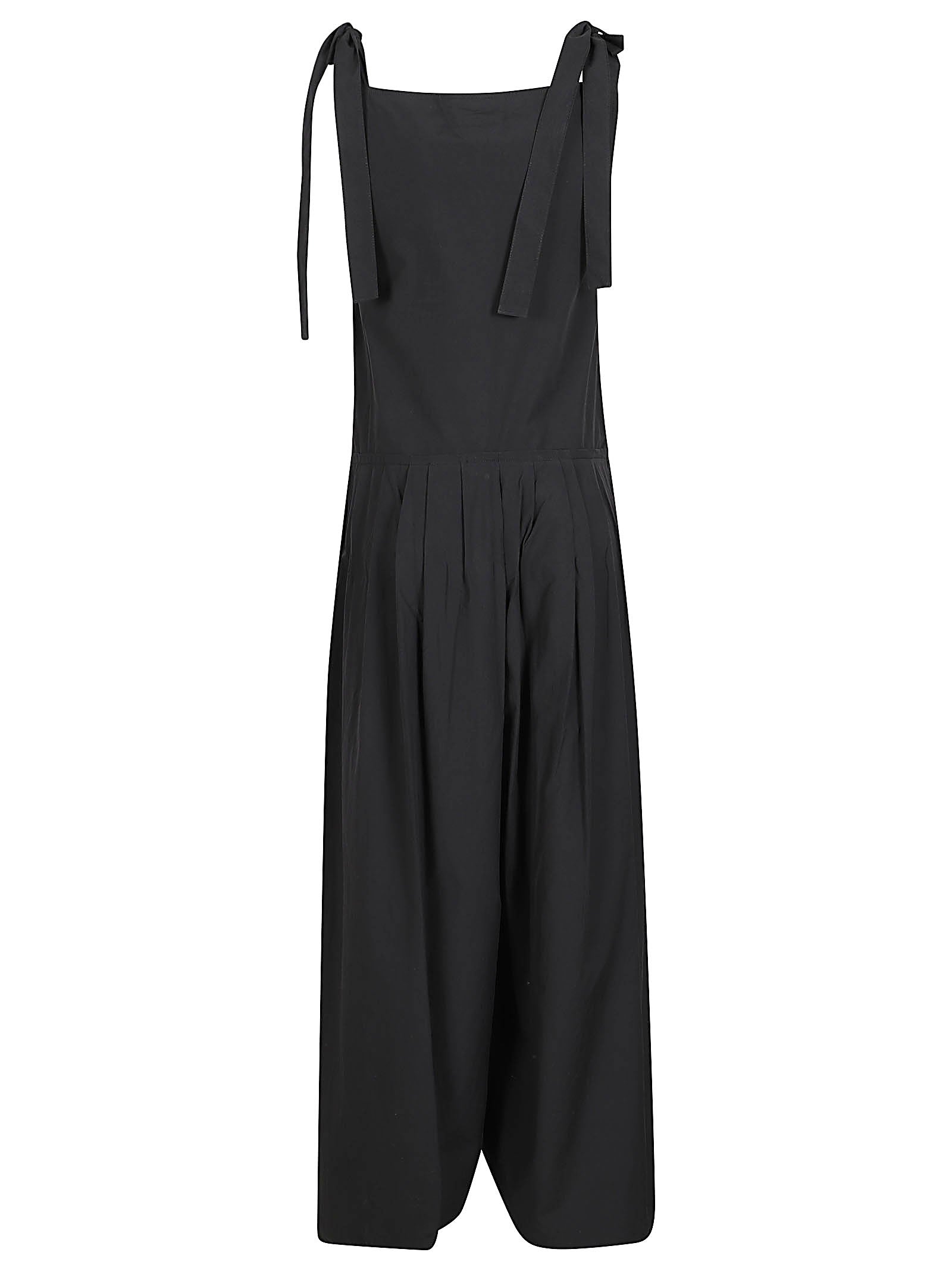 Sleeveless Black Dress with Tie Straps and Pleated Skirt