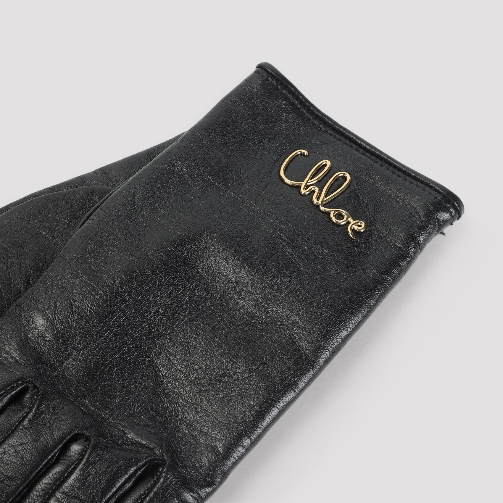 Sleek Leather Gloves with Subtle Logo Detail