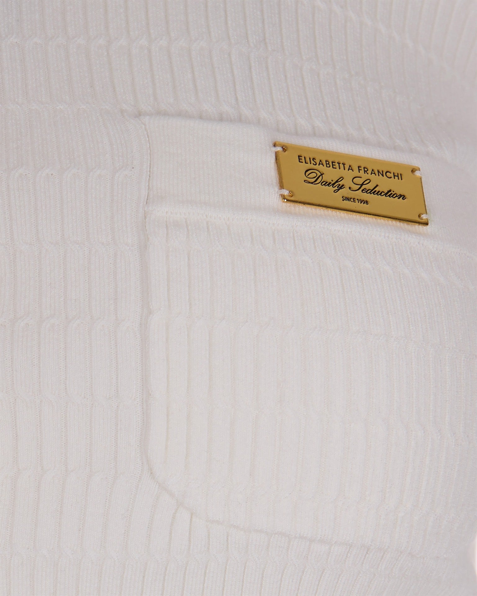 Fitted Ribbed Knit Top With Button Closure