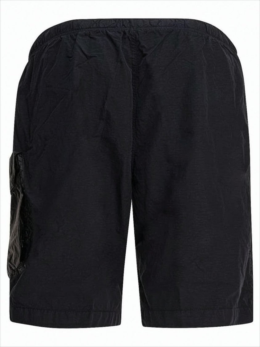 Black Minimalist Beach Shorts with Unique Lens Detail