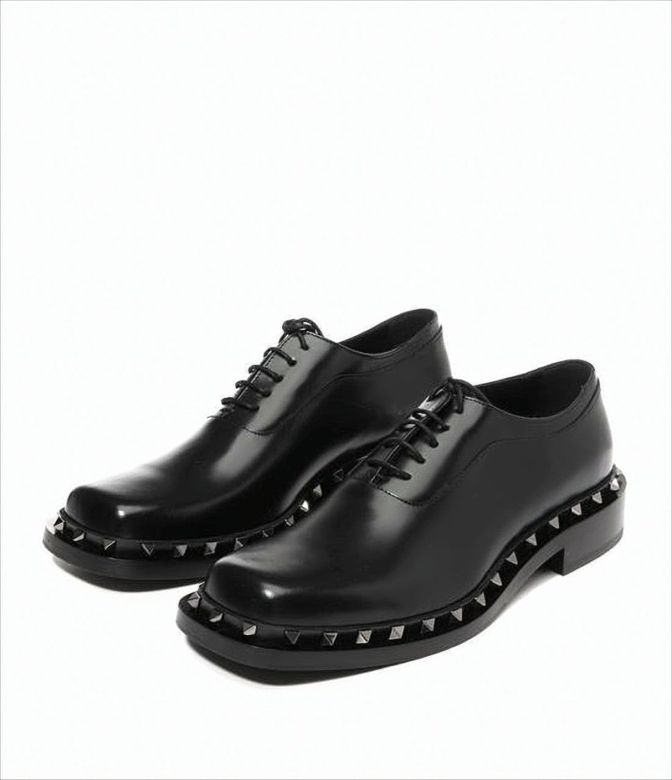Classic Black Leather Loafers with Metallic Pyramid Studs