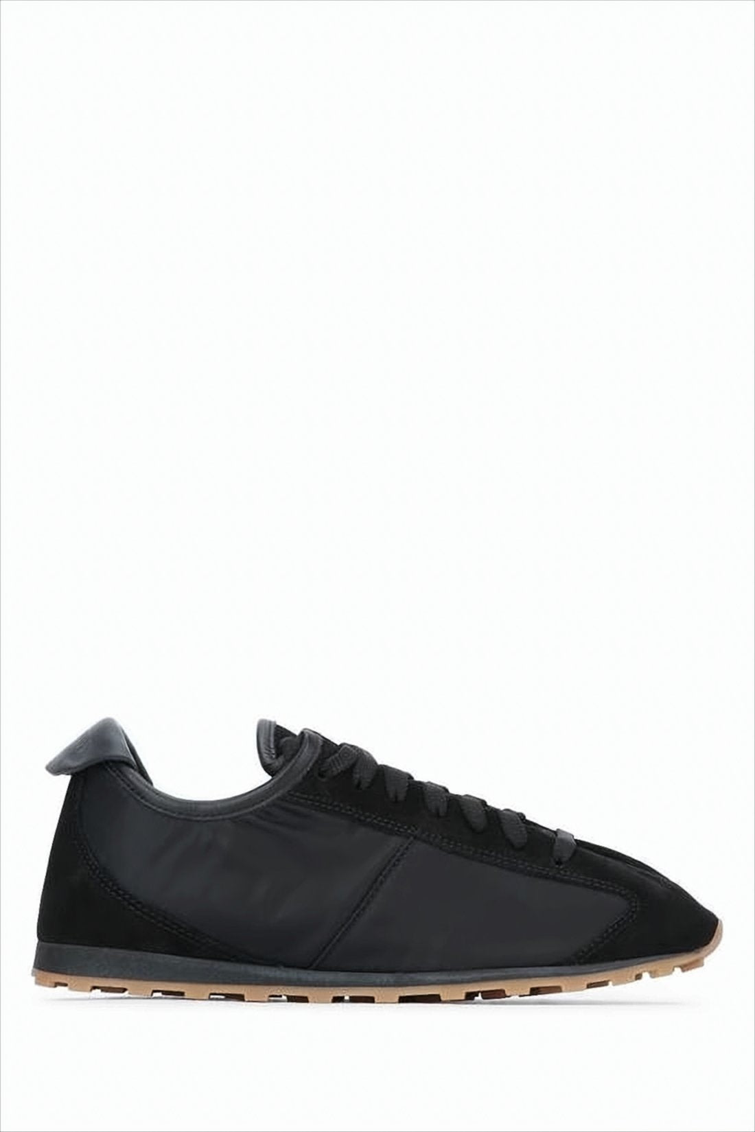 Low-Profile Black Sneakers with Textured Details