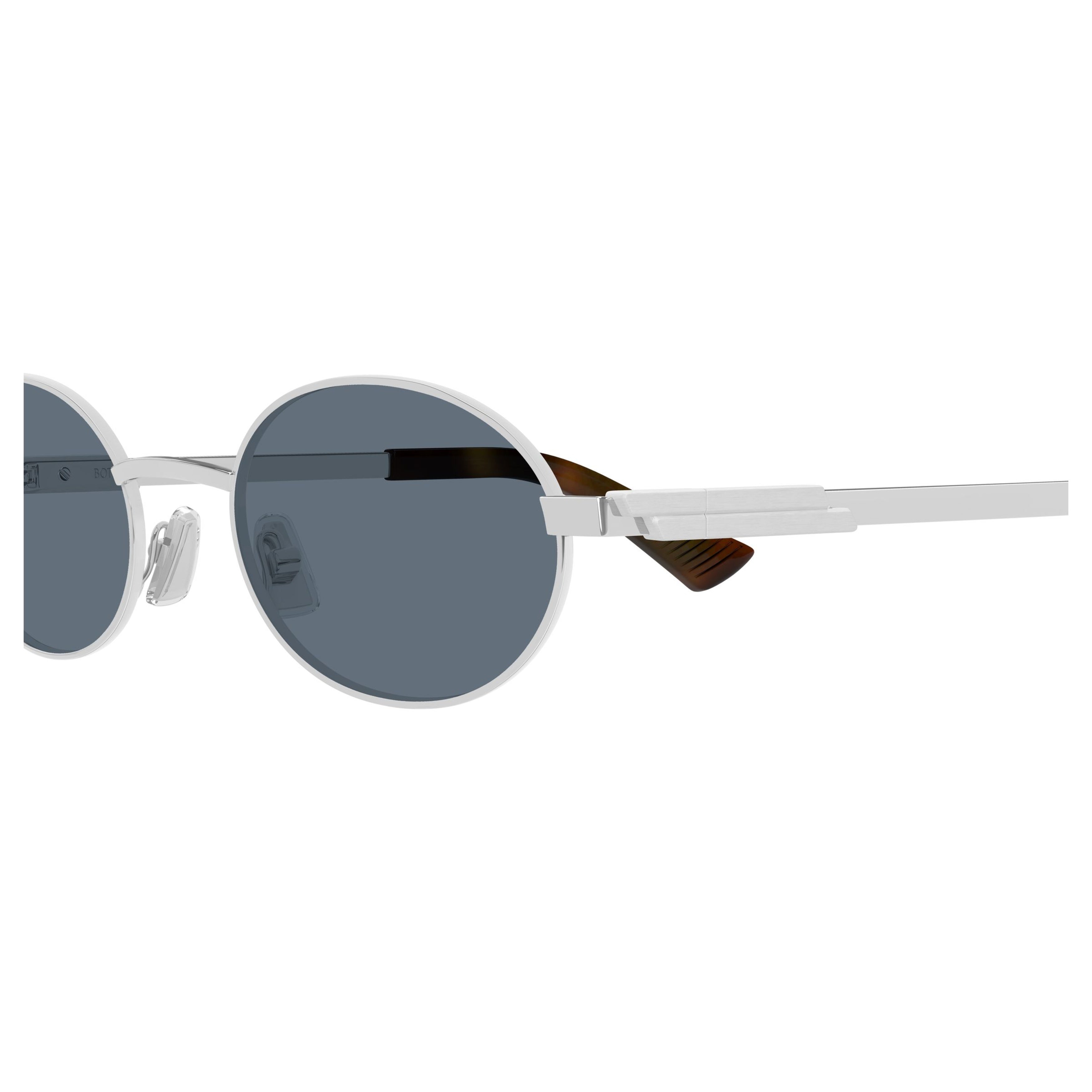 Oval Metal Frame Sunglasses With Dark Lenses And Elegant Temples