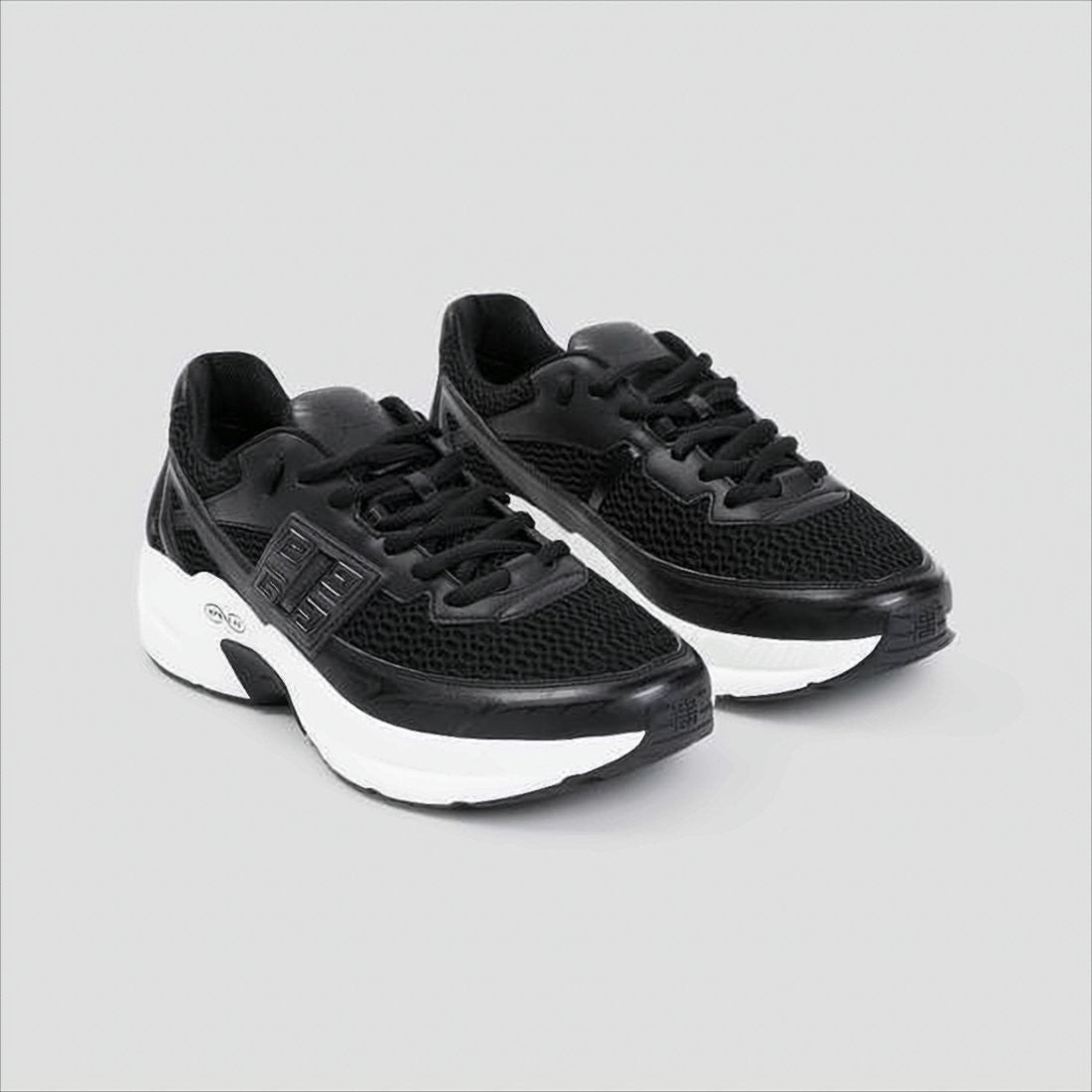 Sleek Black Mesh and Leather Sneakers with Distinctive Logo
