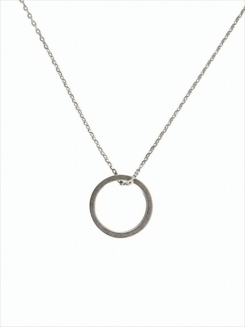 Delicate Silver Necklace With Circular Pendant And Engraved Details