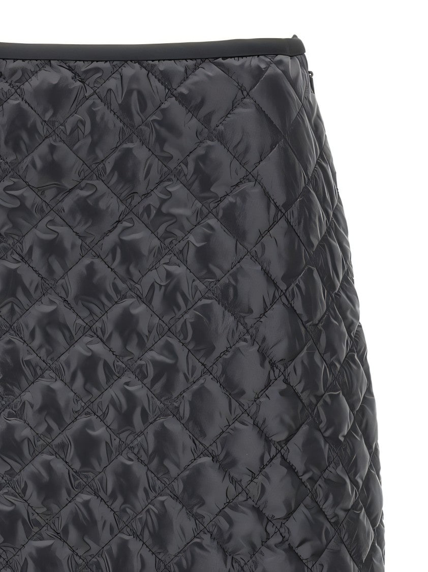 Black Miniskirt With Quilted Design And Glossy Finish