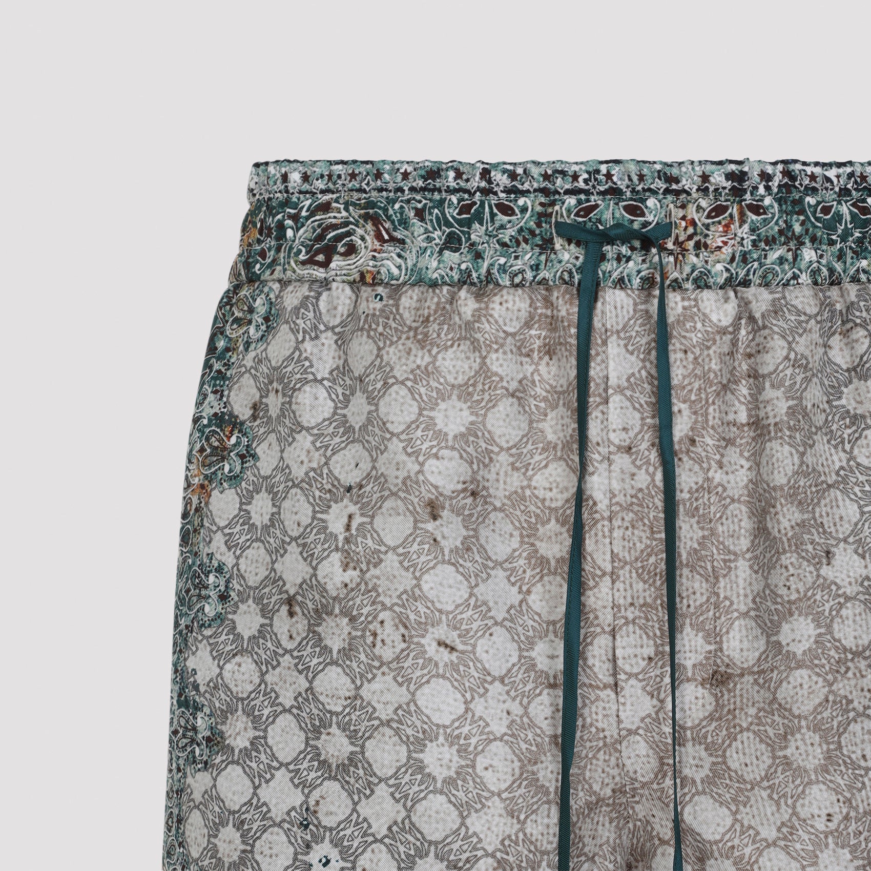 Green Bermuda Shorts With Intricate Geometric And Floral Motifs